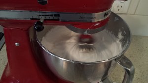 Beat Meringue for 30 seconds between adding batches of 1 Tablespoon of sugar.